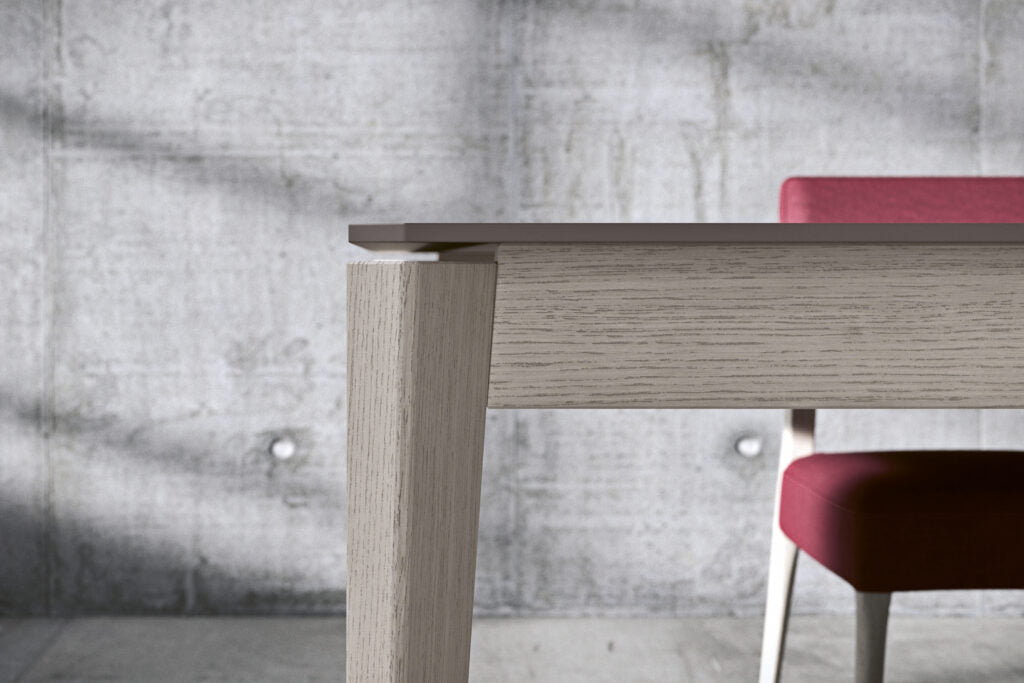 Table TAI - GA – Design sculptural & finitions nobles pour un intérieur d’exception - IMPÉRIAL LINE - La Maison MilanaiseTAI - GA - 4140x90cmPlateau Fenix Rosso Jaipur & Pieds Noyer OssidoFixe