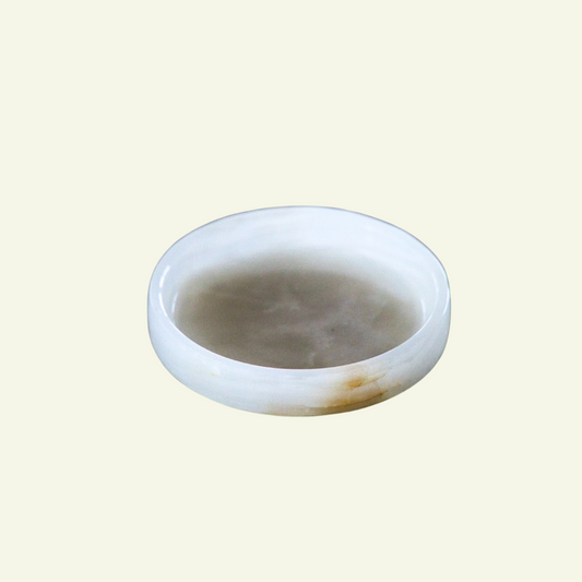 Dessous de bouteille ou vide poche rond en onyx blanc - MANIFESTE